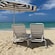Two chairs and an umbrella on a beach in Falmouth, Jamaica